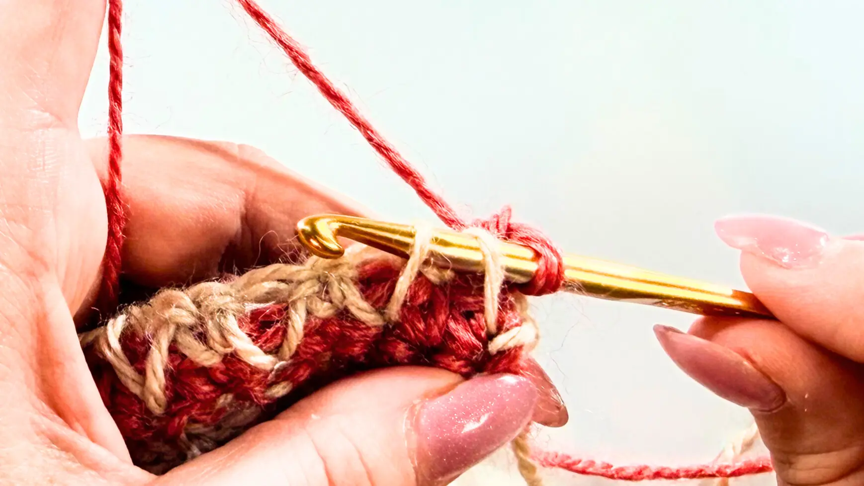 Crochet Honeycomb stitch step showing spike stitch being completed on the hook