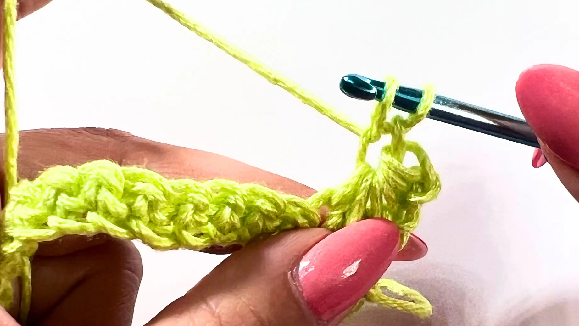 Hook inserted into the “eye” of the previous star, starting the next Star Stitch.