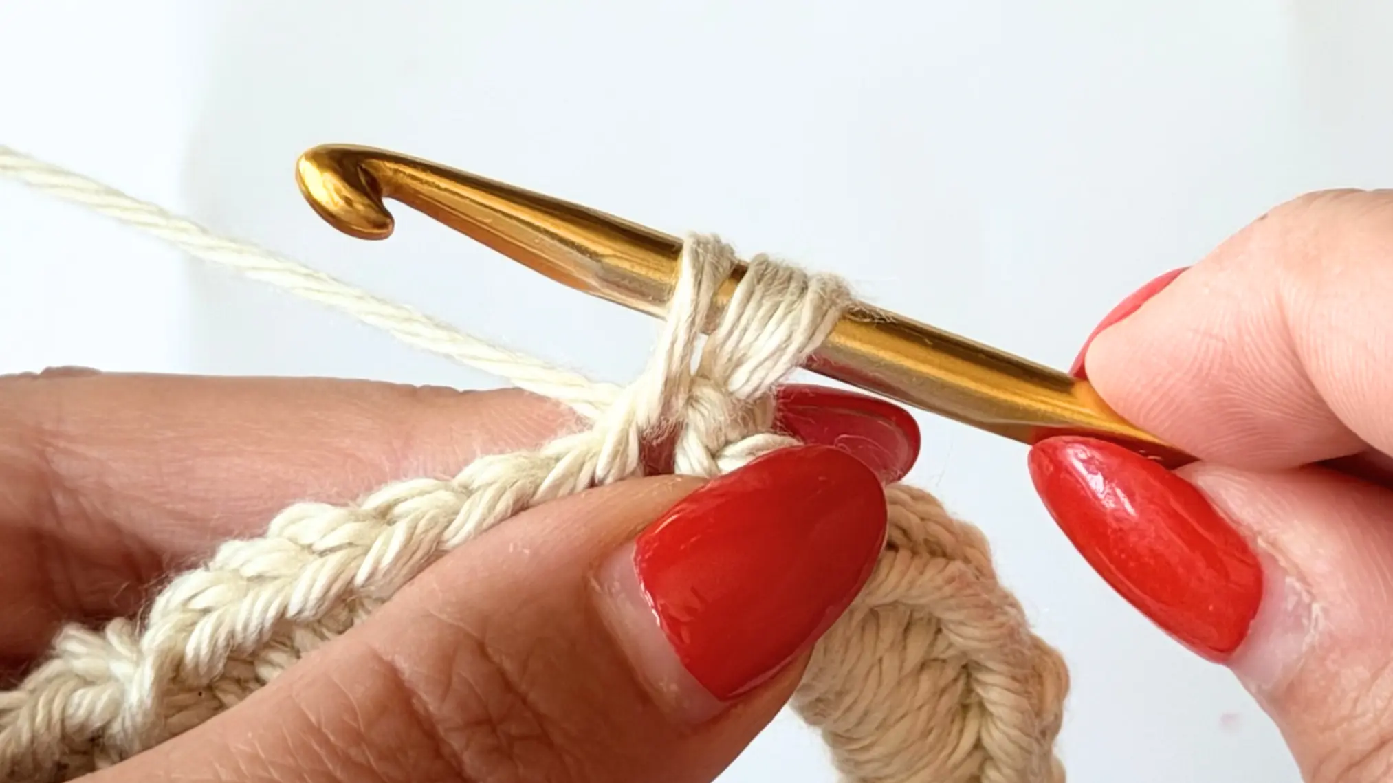Working a half double crochet into the same stitch