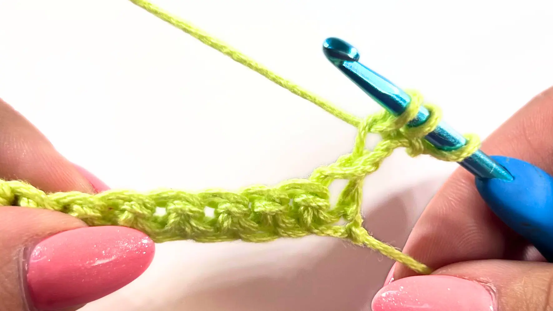 Pulling up a loop into the next chain, building up loops for the Star Stitch foundation.