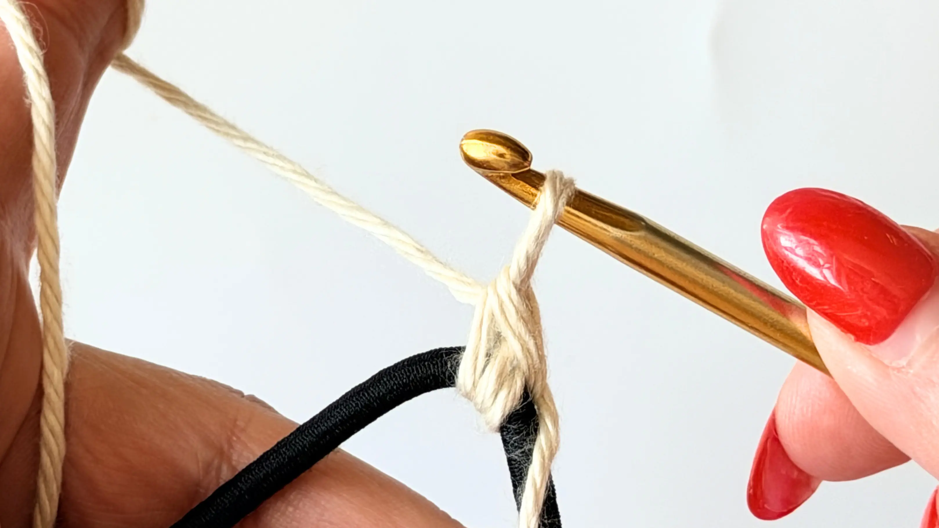 First single crochet completed around the hair elastic