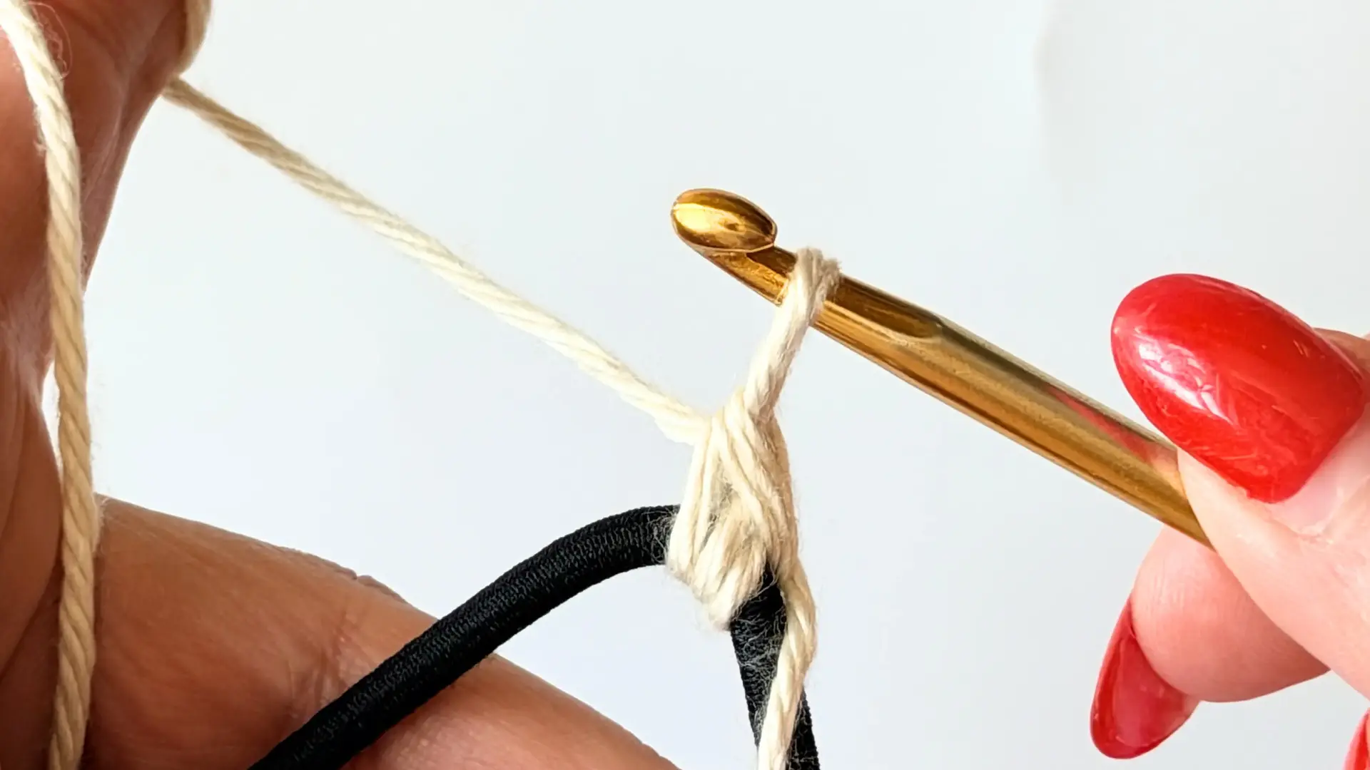 First single crochet completed around the hair elastic