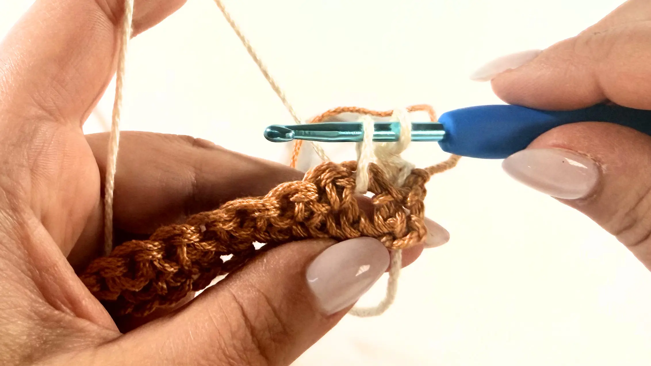 Pulling up a loop for the Spike Stitch.