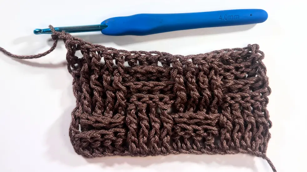Swatch after completing six rows of the Basket Weave Stitch, clearly displaying the woven, checkerboard-like texture created by alternating FPDC and BPDC blocks.