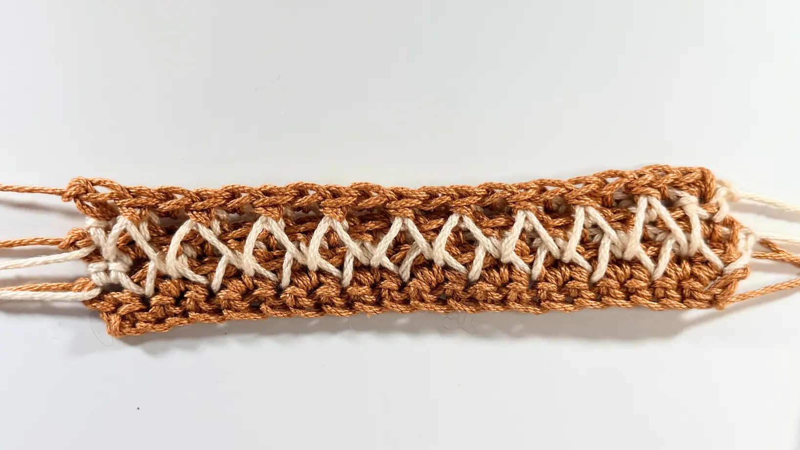 Front view of the completed Row 6 of the Honeycomb Stitch.