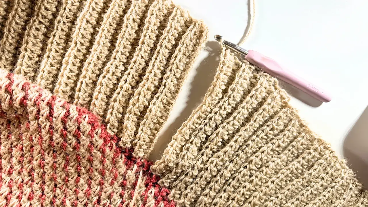 Crochet ribbing worked around the opening of the Wild Rose Cocoon Shrug, showing the textured HDC BLO rows.