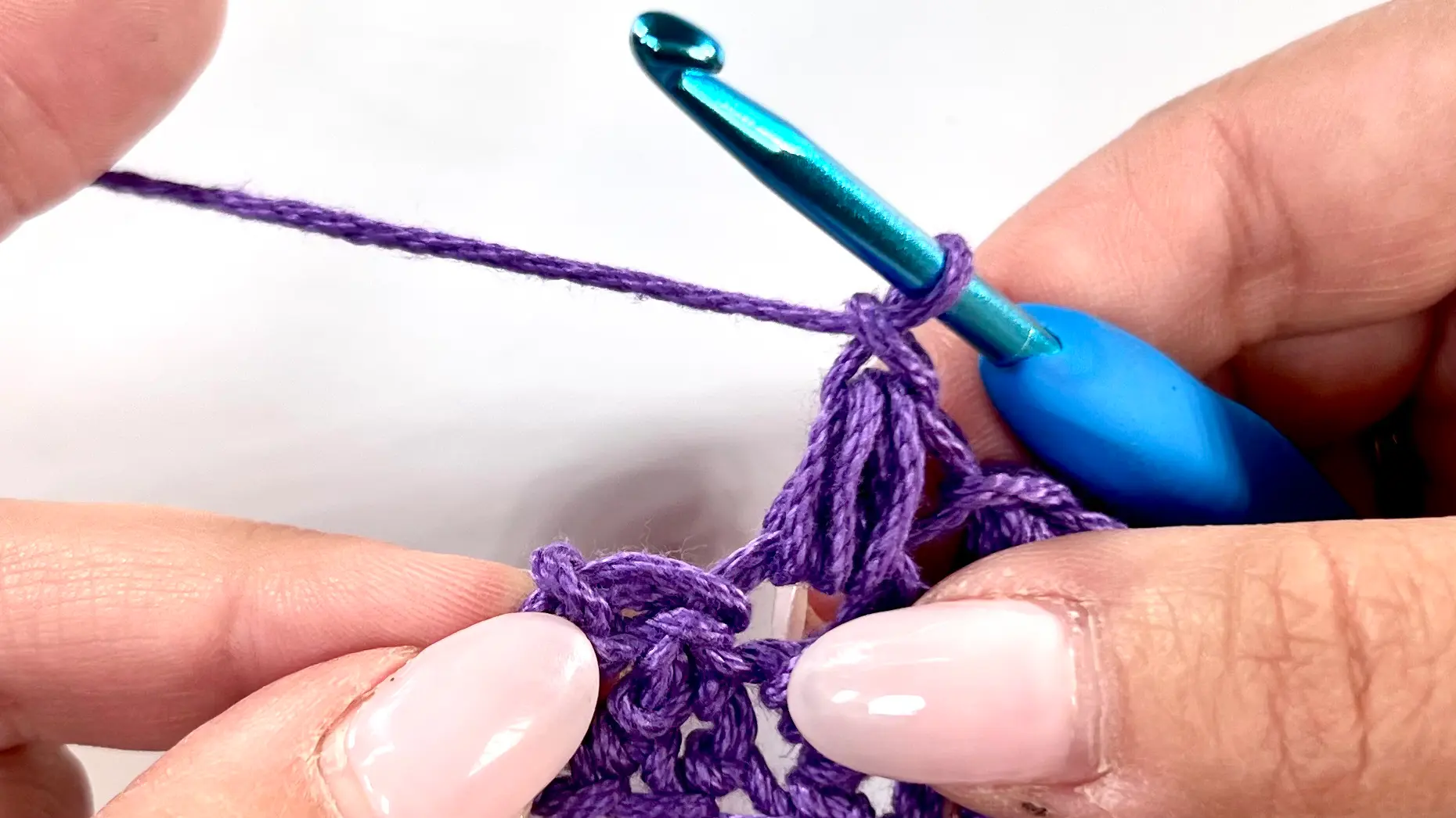 End of the second row of Bean Stitch; the hook is ready to make a single crochet into the top of the last stitch.