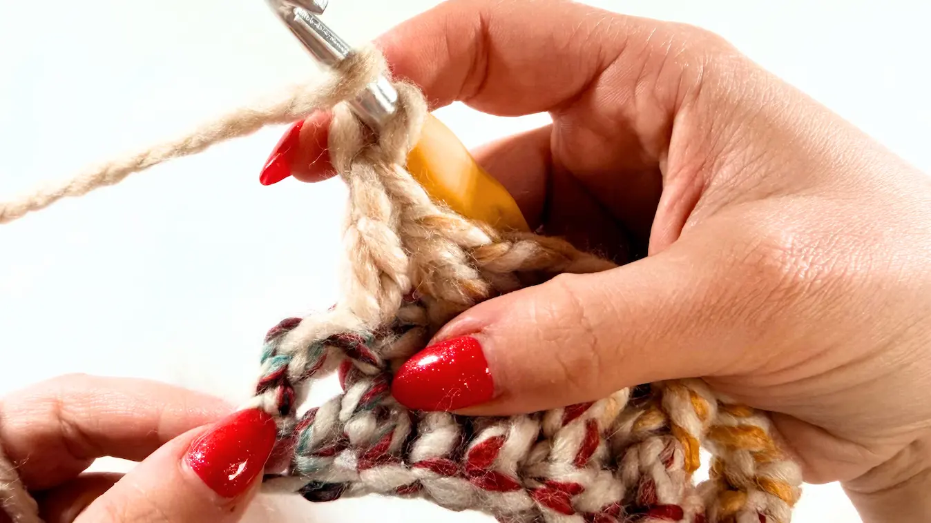 Close-up of the end of the second row where the last stitch will be made.