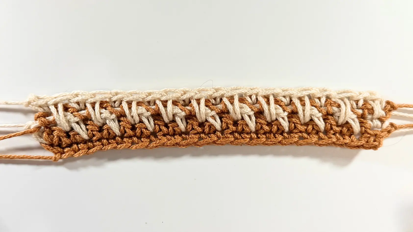 Back view of the completed Row 5 of the Honeycomb Stitch.