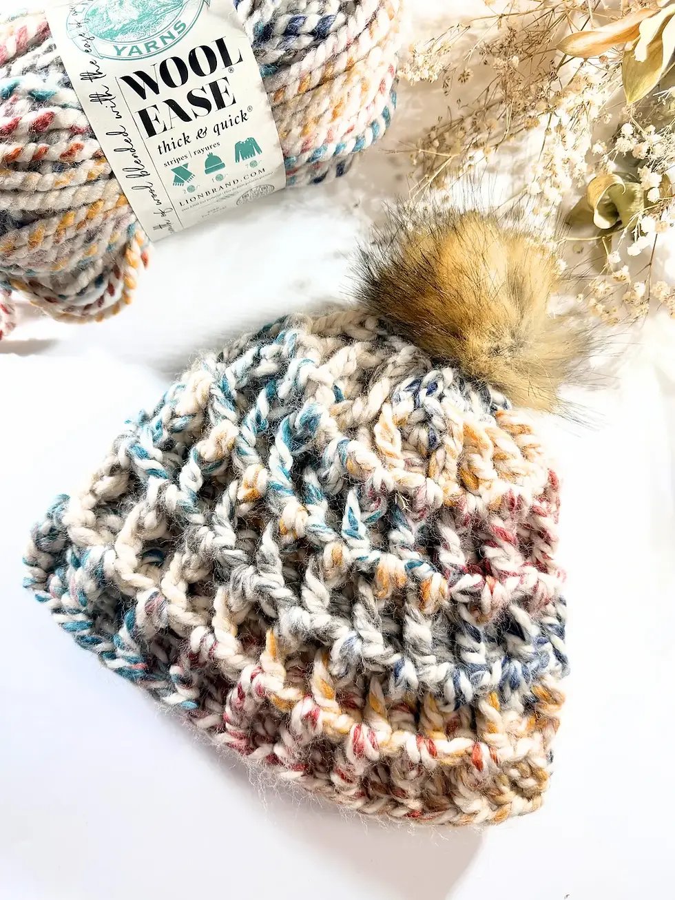 Thumbnail: Textured chunky crochet hat with pom pom and super bulky yarn