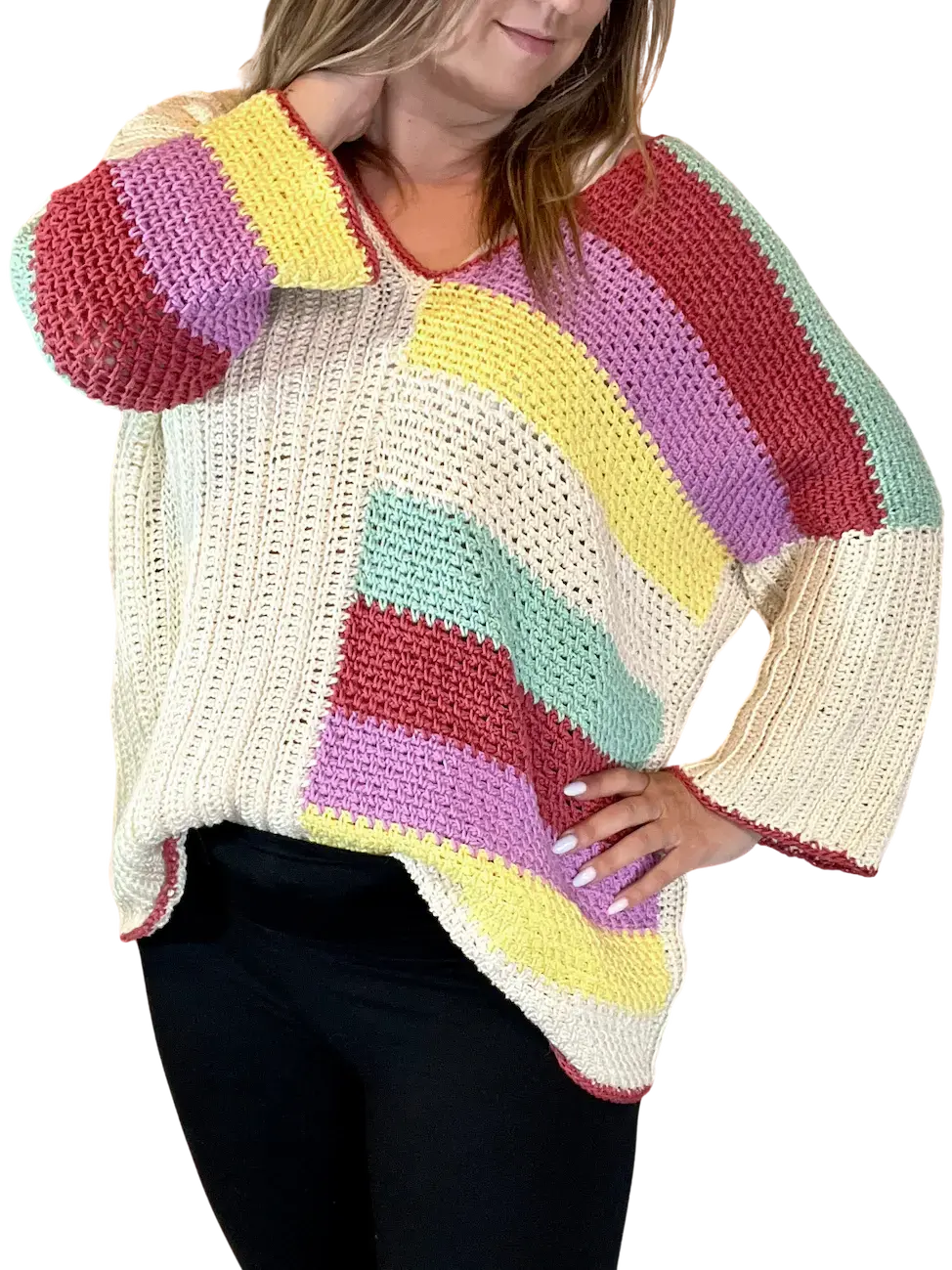 Front view of the Happy Stripes Sweater with colourful diagonal stripes and a relaxed fit.