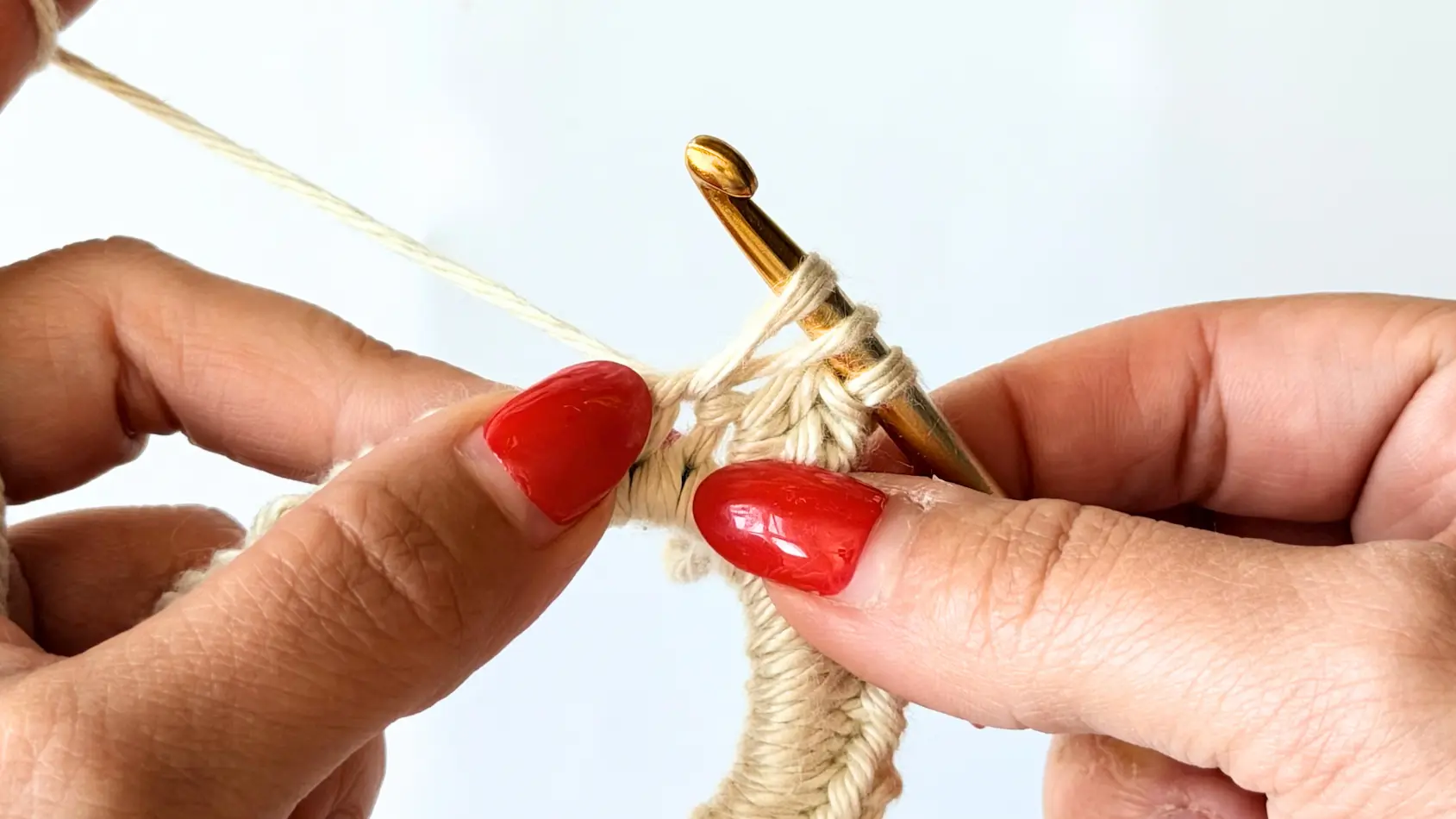 Yarn over and insert the hook into the stitch to begin a puff stitch.