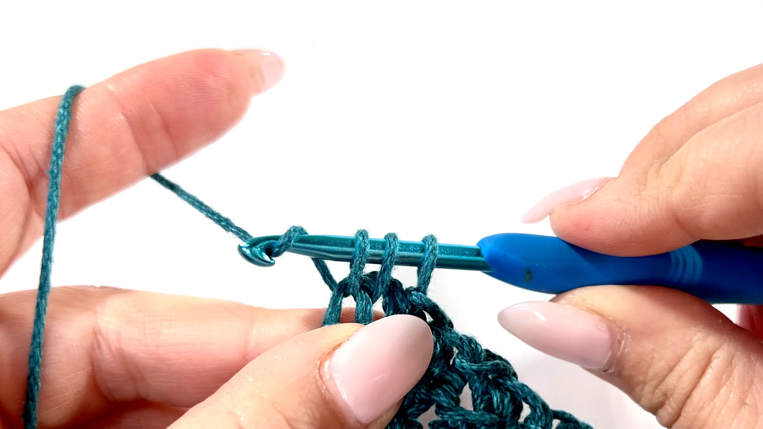 Decrease row nearly complete along the short edge of the rectangle; shaping the edge by stopping two stitches before the row ends.