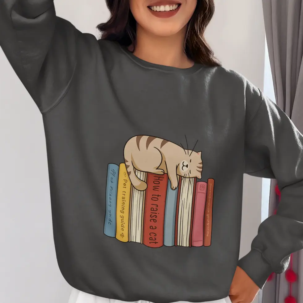 Black Cozy Cat on Books | Graphic Women's Sweatshirt