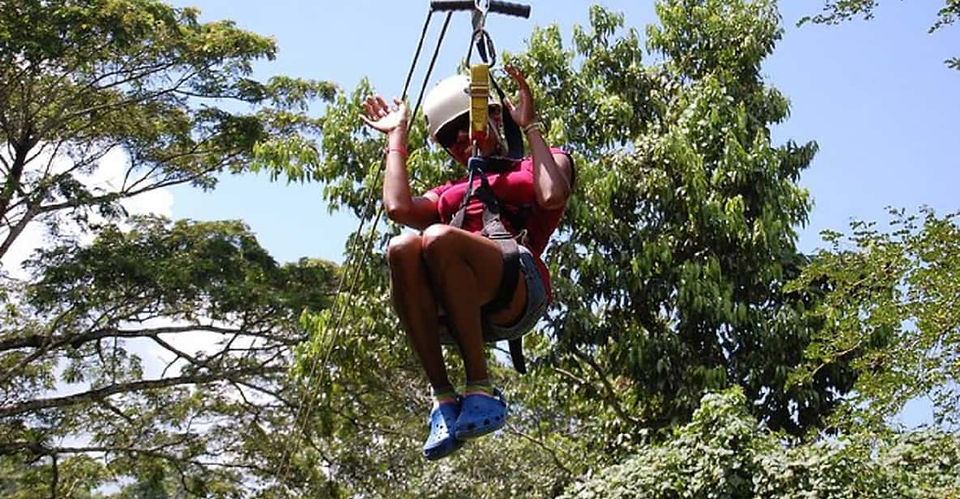 Traveller experiencing the Zipline attraction in Mystic Mountain, Ocho Rios, Jamaica