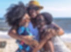 Group of friends Hugging on a beach in Santa Anto , Cape Verde