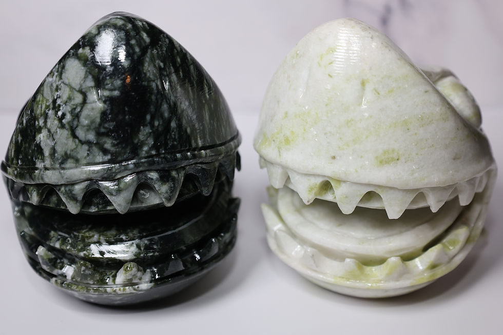 Thumbnail: Giant Shark Head Carvings