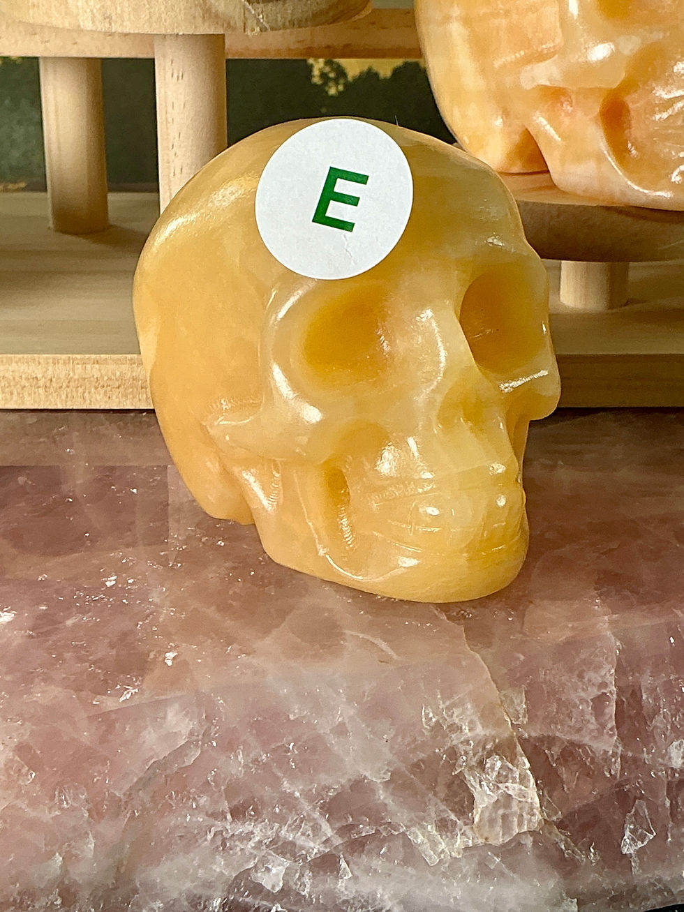 Thumbnail: ✨ Golden Radiance Skull Collection – Hand-Carved Orange Calcite