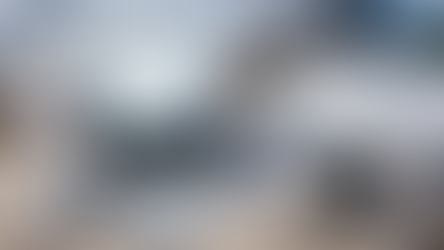 Modern smart tech workspace featuring laptop, charger, docking station, and accessories representing 2026 technology setup.