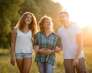 Caucasian family spending quality time outdoor during sunset.jpg