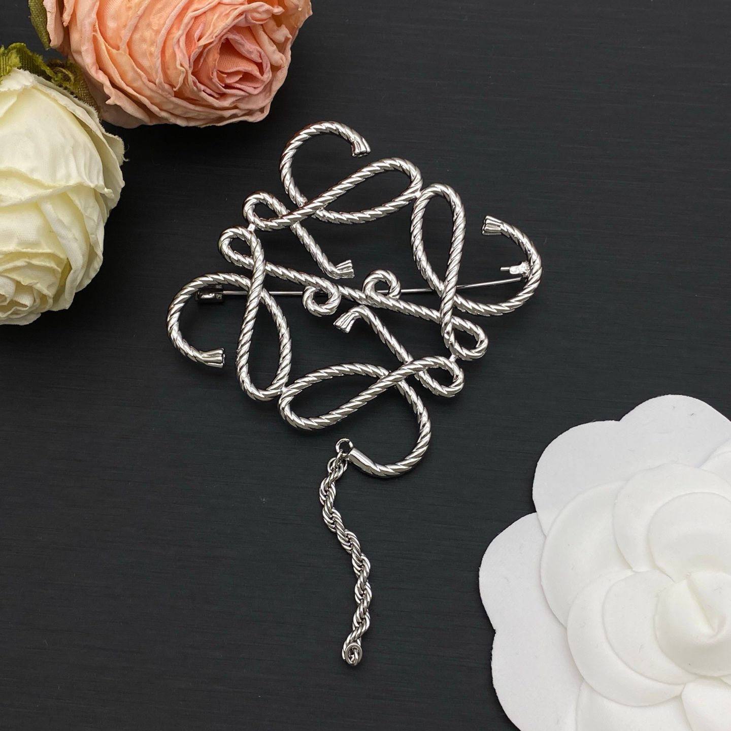 Lo*we silver brooch 