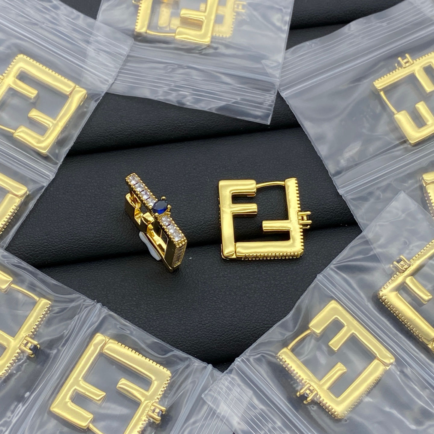 Fendi sapphire encrusted earring 