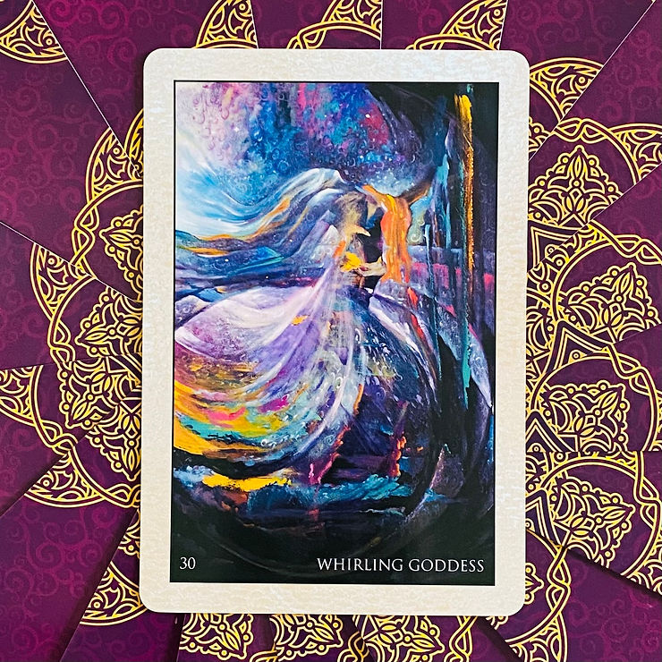On a purple and gold accented background is a single card. It's called Whirling Goddess and is a beautiful painting by Rassouli which shows a woman dancing in a swirl of colours.