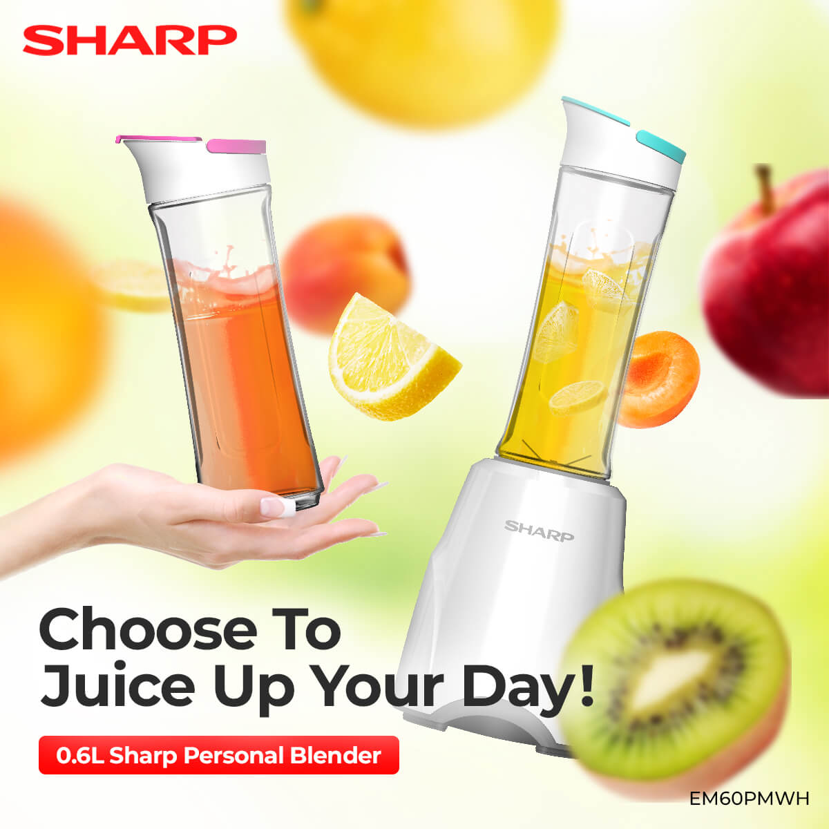 Hand holding Sharp Personal Blender with apple, kiwi, lemon and oranges floating at the background 
