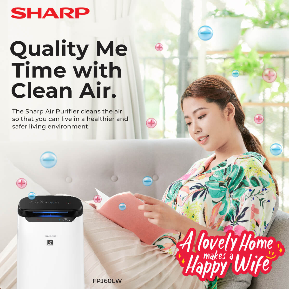a woman reading book on a sofa with Sharp air purifier infront with ion