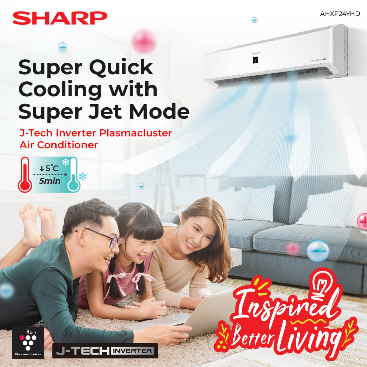 Mom and Dad using laptop with daughter under Sharp aircon with ion