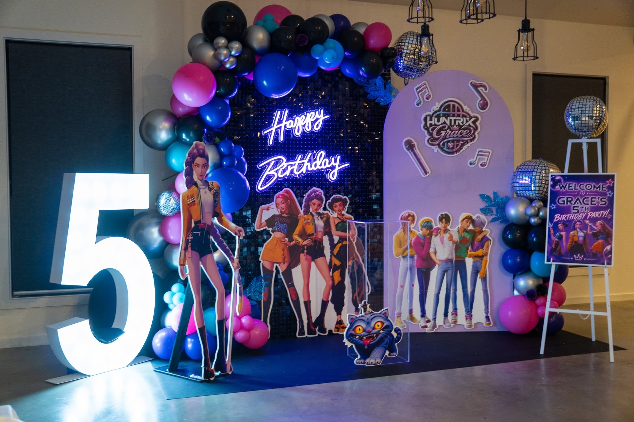 Party Pop Kids event styling with balloons and backdrop