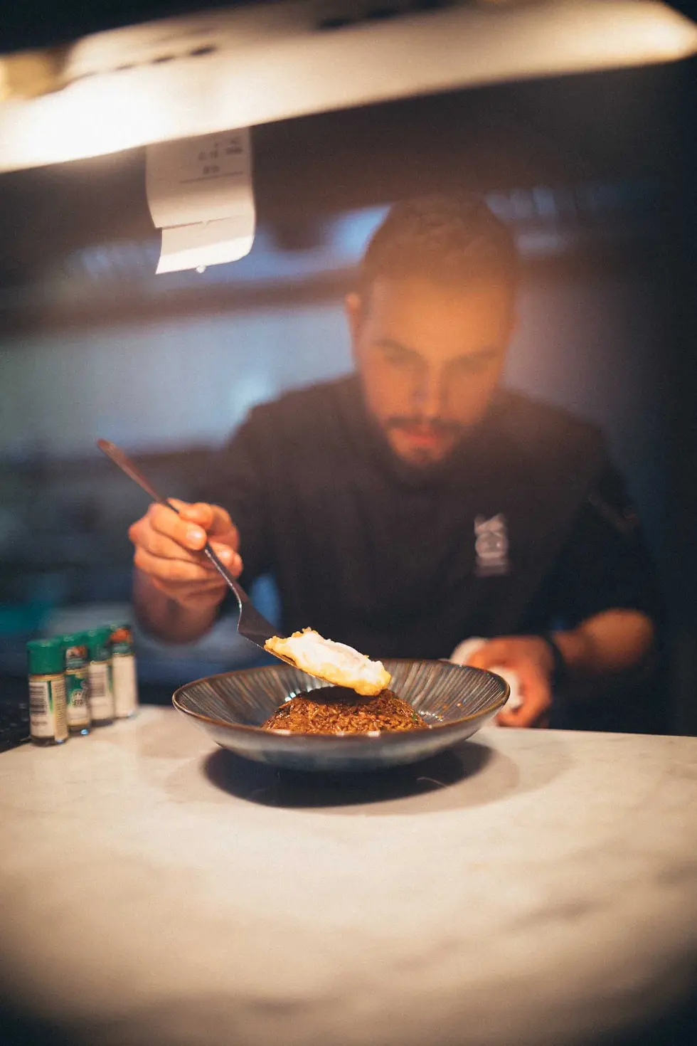 Chef prepares Nasi Goreng at Koi in marbella