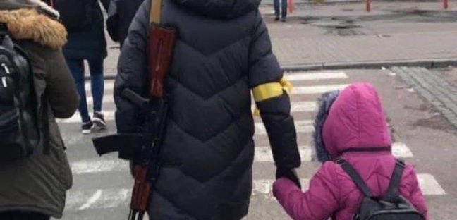 Armed Mom in Kyiv.jpeg