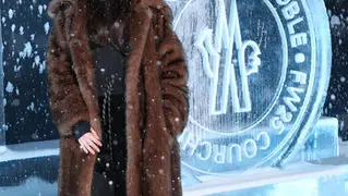Anne Hathaway Embraces Après-Ski Glamour in Furry Coat at Moncler Grenoble Fall 2025 Show