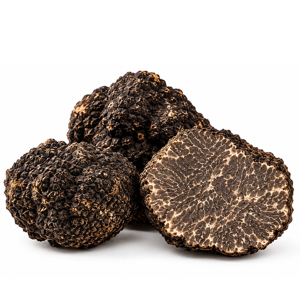 Fresh Black Truffle of Norcia (Tuber melanosporum), whole and cut open, displayed on a rustic wooden surface.