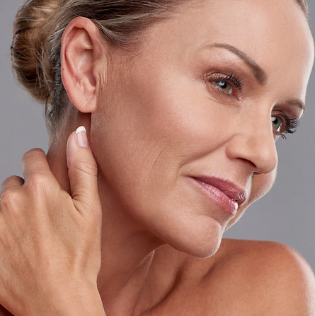 Woman with clear, glowing skin representing aesthetic and skincare treatments at People's Aesthetic Clinic