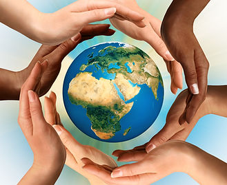 Conceptual symbol of multiracial human hands surrounding the Earth globe. Unity, world pea