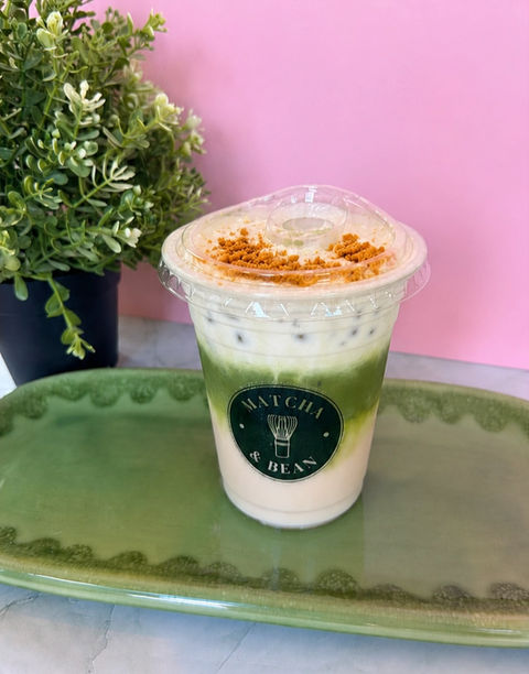 Signature Biscoff iced matcha made with hand-whisked PerfectTed ceremonial-grade matcha, vanilla cold foam and Lotus Biscoff biscuit at Matcha & Bean.