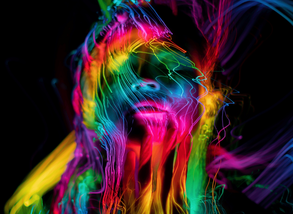 Silhouette face with a mix of beautiful colors.