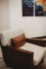 Comfortable chair with brown pillow