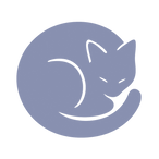 Silhoutte of a curled up cat - contented