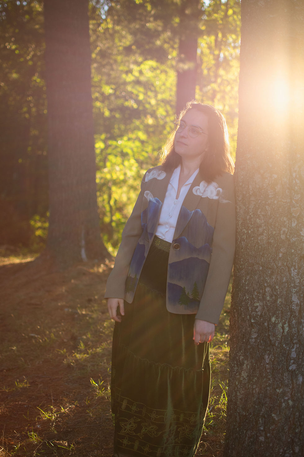 Thumbnail: Woman wearing Blue Mountains blazer at sunset