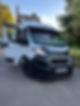 White Peugeot Boxer van parked on a driveway after glass installation
