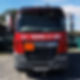 Front view of a red truck with "K.P. Thomas & Son" in white
