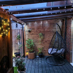 Cosy patio with a hanging chair