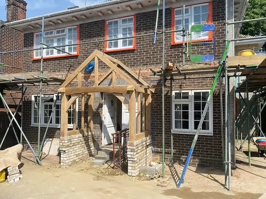 A house under construction with scaffolding