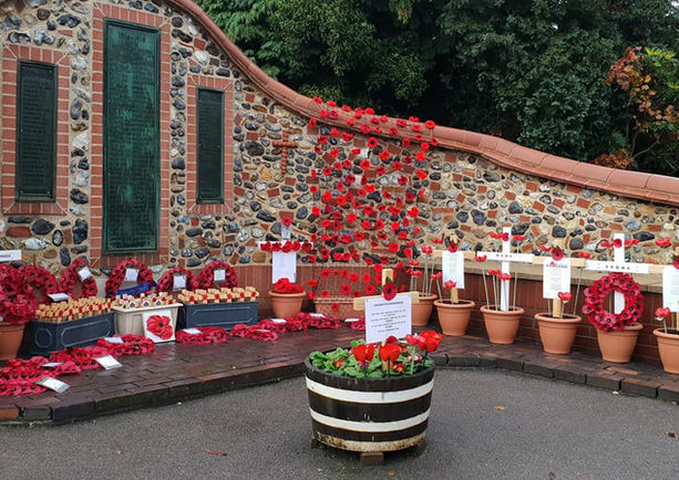 A memorial filled with red poppies