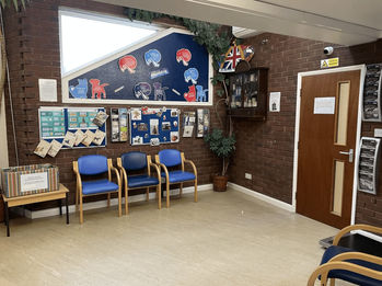 Chairs against the wall at the reception of veterinary centre