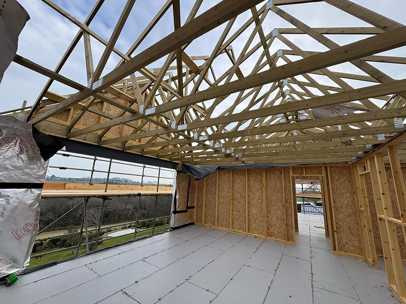 Exposed oak roof beams during a loft renovation in Launceston