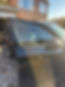 Close up of a clean car window reflecting the sky after repair